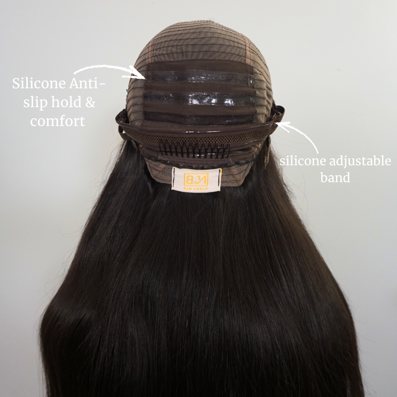 Glueless wig with labeled silicone anti-slip hold and adjustable band on a plain background for a secure wear