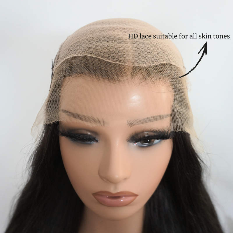 Mannequin head with a wig featuring HD lace suitable for all skin tones on a white background.